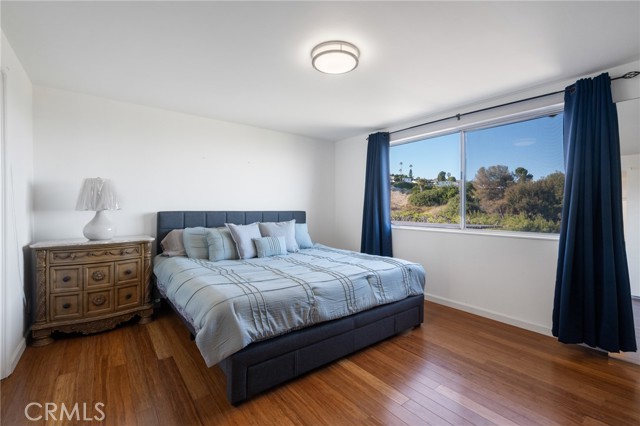 Primary bedroom with an amazing view at any time of the day or night. Enjoy the view of DTLA from here.