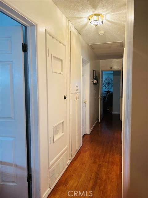 Hallway leading to bedrooms and bathrooms