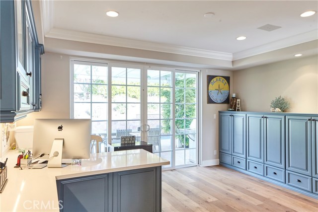 View of additional built-ins and sliding door accessing the backyard