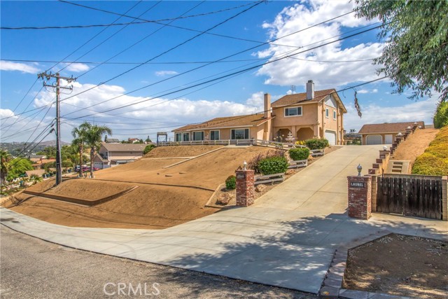 What a driveway! This is one of two driveways in property!