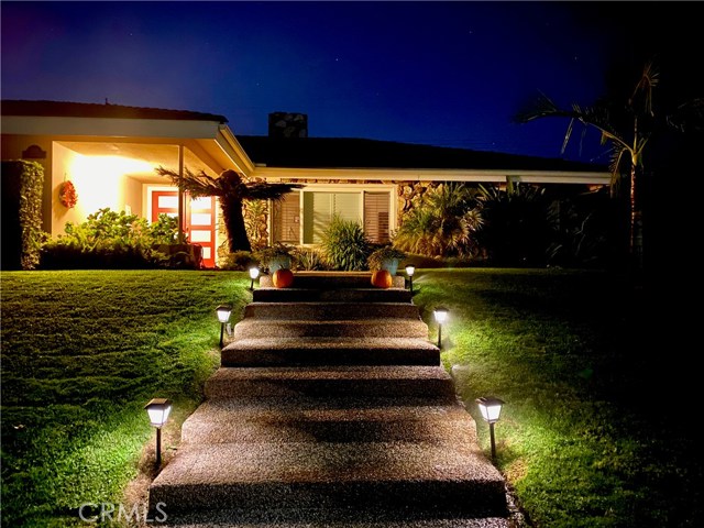 1881 Coolcrest Avenue Upland, California Turn-key mid-century home in established neighborhood. Single story 4 bed, 2.5 bath FULLY remodeled in 2015. Open floorpan with custom finishes. Kitchen features shaker cabinets and white quartz counter-tops. Huge waterfall island with room for dining. GE Profile appliances and large farmhouse sink. All bathrooms remodeled including a permitted master bath addition. Master bath features dual-sinks plus vanity, large walk-in shower with frameless glass doors, modern soaking tub, and separate toilet cubicle. Master bedroom offers a large walk-in closet. Sliding doors off the bedroom lead to zen-like covered patio with views of the pool. Fourth bedroom features a $7000 built-in office upgrade plus room for a full size bed. Second covered patio off family room features outdoor kitchen with mini-fridge, sink, and gas cooktop plus room for outdoor dining. Pool and spa also remodeled with new tile, brickwork, and pebble bottom PLUS solar heating so you can swim most of the year! Backyard also features a fire pit and low-maintenance artificial grass. Oversized two-car garage is detached and was fully finished with insulation, drywall, tiled floors, TONS of built-in storage, plus French doors that lead to the pool. Recessed lighting, solid-core interior doors, custom paint, and window treatments throughout. New electrical panel and HVAC. Gorgeous mountain views, Pepper Tree school district, walking distance to Euclid Trail, easy access to the 210 freeway and Colonies Shopping Center.