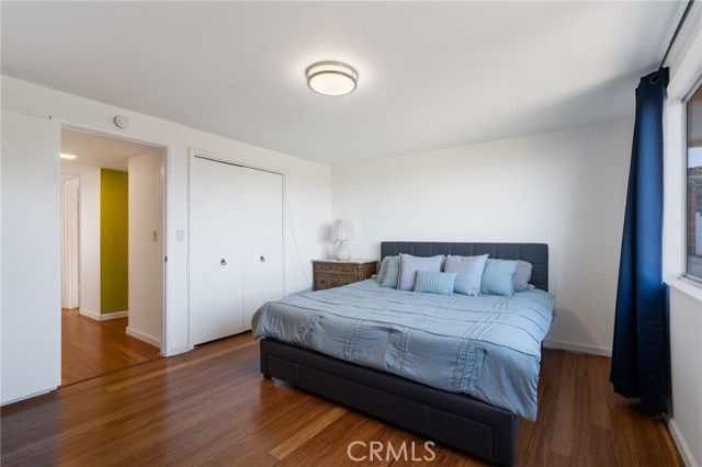 This magnificent primary bedroom offers two closets. This picture shows one of them.