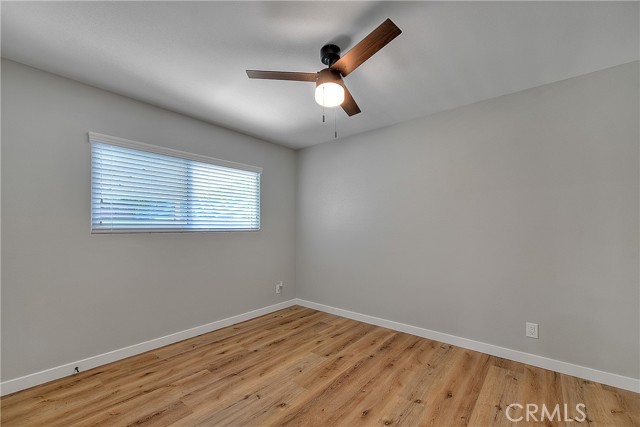 Bedroom 1 New Flooring, New Windows, New Blinds, New Ceiling Fan w/light. New Baseboards.