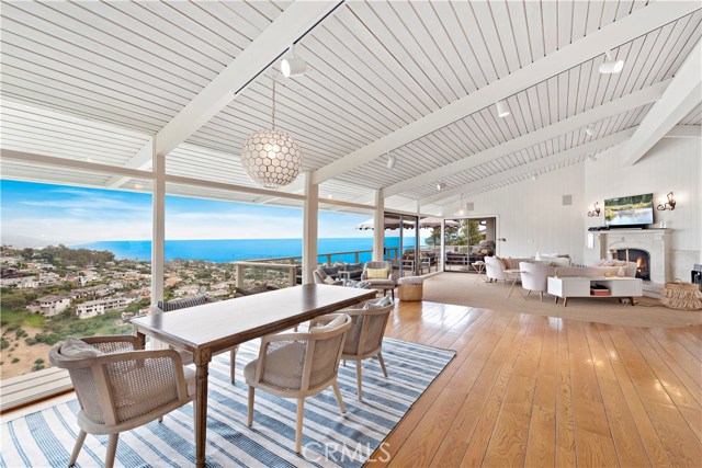 1423 Emerald Bay Laguna Beach, California This spectacular ocean view home is nestled behind the gates of the ultimate beach community of Emerald Bay. Immediately upon entering the home, visitors are greeted with floor to ceiling windows which allow for unobstructed, panoramic views all the way to Dana Point. Generous deck space provides the perfect venue for entertaining. This 4 bedroom / 3.5 bathroom home has a main floor master bedroom plus three additional downstairs bedrooms. Emerald Bay residents enjoy a pristine, half-mile wide beach, parks, tennis courts and association pool & spa.
