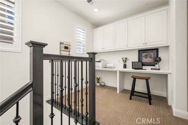 Upstairs loft with Built-In Workstation with Ample Storage