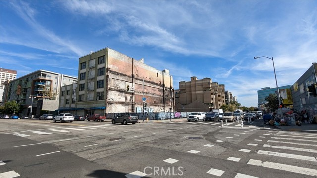 262 S Los Angeles Street Los Angeles, California Opportunity Zone redevelopment property in Little Tokyo area located at the corner of S Los Angeles and 3rd Street. This is a truly rare opportunity for a buyer to own in one of the most diverse and growing neighborhoods of Downtown Los Angeles. Walking distance to world renowned museums, restaurants/bars and new residential developments, it is undeniably the place to be. The demolished 3-story with basement building at 262 S. Los Angeles Street had over 30,000 square feet of mixed use retail, office and warehouse space. The property sits on two parcels of land (APN 5161-025-004 and 5161-025-001) for building and easement. The building was heavily damaged due to fires and undergoing clean-up and demolition. At the time of the fire in 2021 and for over a decade, because of the heavily traveled traffic location, the building has always had over 90% occupancy. With its unparalleled access to Downtown Los Angeles, the location has additional benefits from traffic in nearby offices, residential, retail and other usages including multitude of cultural icons including the Walt Disney Concert Hall, Dorothy Chandler Pavilion, Ahmanson Theater, LA Live, Nokia Theater, Staples Center and many more. For additional information, please contact listing agent directly. Buyer and agent/broker to verify the accuracy of all property details such as lot size, square footage, zoning, permits, use code, taxes and/or other information. Neither seller nor their agent/broker makes any warranties or guarantees regarding this information.