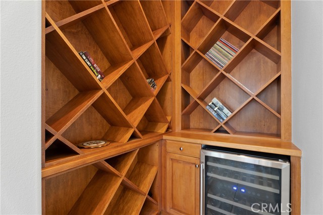 Built-in wine rack with 36 bottle temp controlled wine refrigerator.