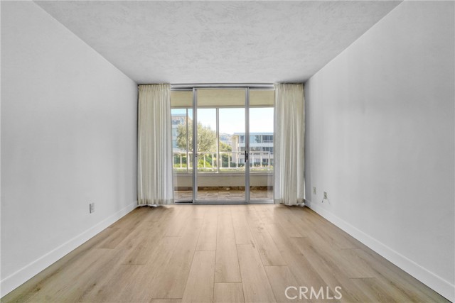 Bedroom with Balcony access.