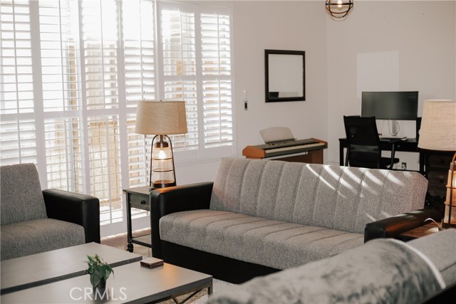 Living Area with custom sliding shutters.