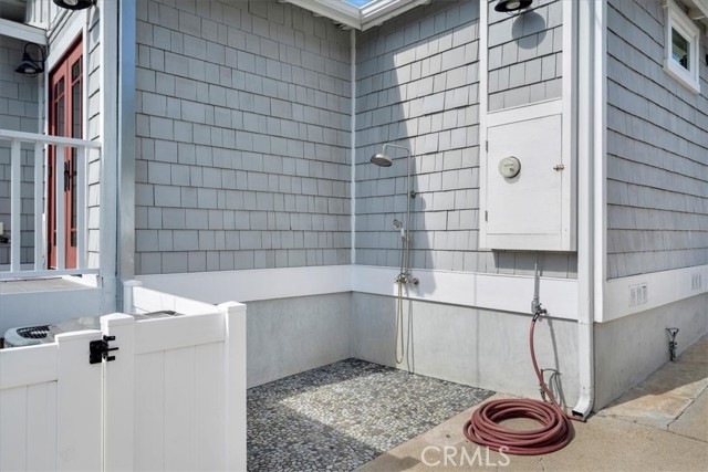 Outdoor shower is nice to have if you have kids, surf and live this close to the beach