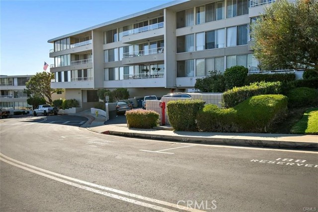 Garage entry can be seen in this photo. Unit comes with two side-by-side spots (that are separated from other parking spots) and two storage spaces.