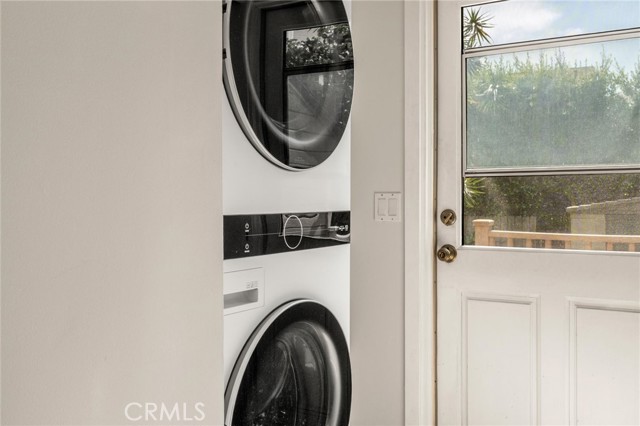 Newer washer and dryer near the back door.