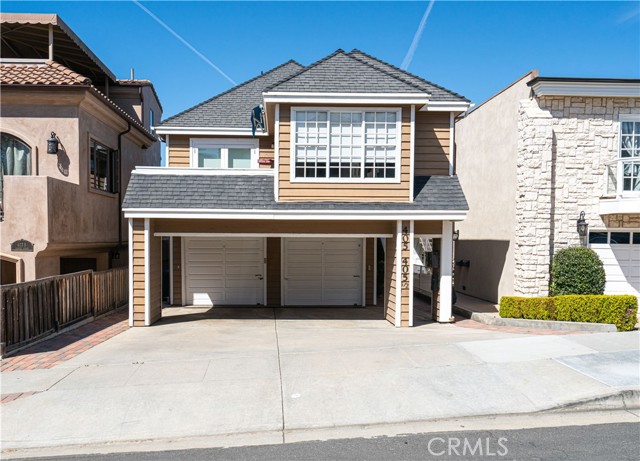 405 Jasmine Avenue A Corona del Mar, California Spacious 3 bedroom condo located oceanside of PCH and one street over from the famous Goldenrod Bridge. The dual-level floor plan in this back unit is ideally laid out to maximize space. The living space and kitchen is open and inviting. The kitchen is a chef’s dream highlighted by stainless steel appliances, a 5-burner stove, wine refrigerator and plenty of storage. The kitchen separates dual living rooms with the largest room including a stack stone fire place and a connecting outdoor patio. 2 bedrooms and 1 bathroom are on the main level. The bedrooms are bright and airy and closets have been outfitted with organizers. The private master suite is located downstairs and includes an en-suite bathroom and an outdoor deck space accessible from suite. One garage spot and one tandem carport spot is included. This home is just a few short blocks from legendary Main Beach and the world class shopping and restaurants of CDM. Won’t last long!