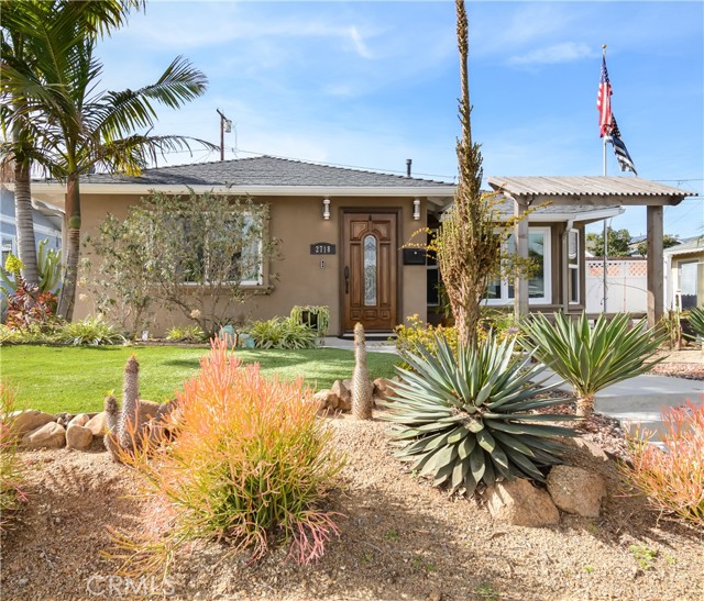 Front of the house with beautiful landscaping!
