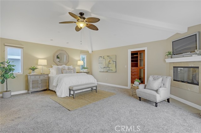 Large master bedroom with fireplace and very spacious walk-in closet