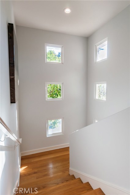 Light and open stair case leading to the second floor