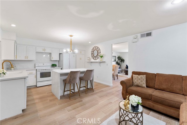 Kitchen flows into Family Room