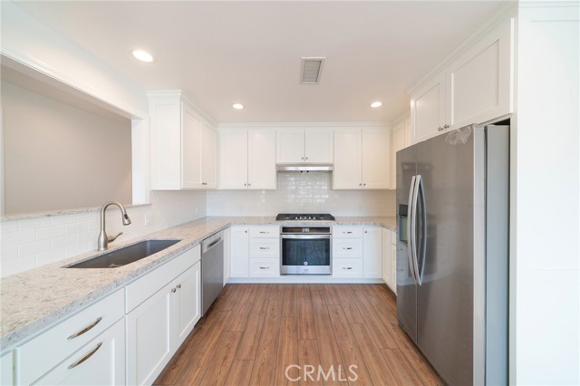 Spacious kitchen with lots of counter space.