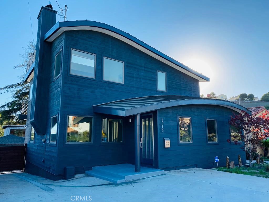 1315 W 22nd Street San Pedro, California ROOFTOP OCEAN VIEW HOME!! Only the highest quality material was used in this home. This home features 4 bedrooms and 2 bathrooms. Upgrades are throughout the house, Luxury waterproof Vinyl wood flooring, Pella Custom Window, Contemporary looking Aluminum Roof, Custom kitchen cabinetry, mosaic tile back-splash, granite counter top, island with extra cabinets and seating. Only Top of the line appliances have been used, with Subzero built-in Refrigerator, 48" Oversized Thermador Stove and Oven combo & Thermador Ventilation System and Miele Coffee Maker. The home is bright and airy with lots of natural sunlight in every room. Newly painted interior and exterior with a contemporary color pattern. Bathroom has been renovated with designer porcelain & glass tiles along with newly built cabinetry. All bedrooms are spacious and bright. Second floor is a Master Suite, with seating area, fireplace, and the beautiful View of the Ocean. The entire house has been fully renovated in 2004 with 1,074 SQF of addition and newly designed Contemporary outlook and interior Open layout. On the same year, 2 permitted rooftop decks have been added to the house with a total of 758 SQF of outdoor space. Both Roof Decks have a beautiful View of the Ocean during the day and City light view at night time. There's so many upgrades in the house, You will have to see it to believe it!!