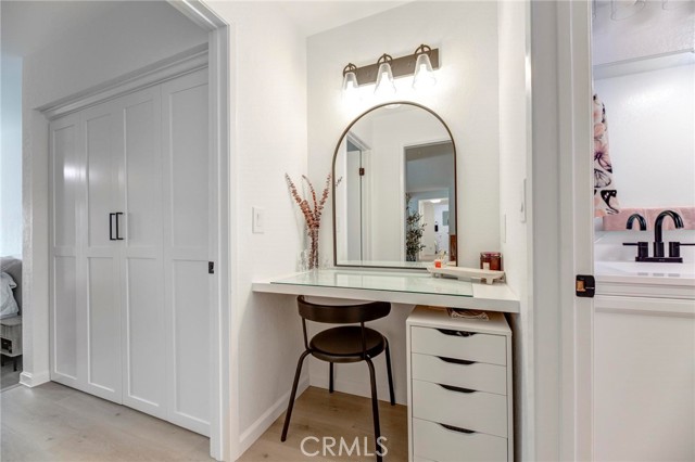 Built in vanity area connects the main bedroom and bathroom