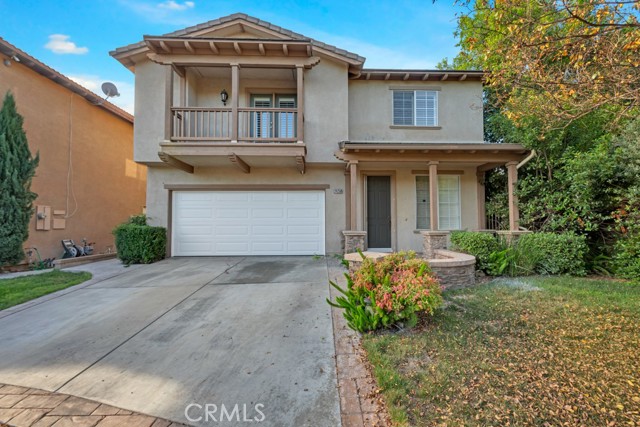 24256 Kotler Court Valencia, California NO MELLO ROOS, LOW HOA Silhouette cul-de-sac home! Attractive, 2-story, 4 bed, 2.5 bath, almost 2000 sq ft house in private cul-de-sac in highly desirable neighborhood in Valencia. Hardwood floors and fresh interior paint throughout. Great curb appeal with verdant front yard, mature shade tree, stately curved brick lined walk and covered porch. Entry leads to formal living room with plantation shutters. Great room, comprised of kitchen, dining, and informal living areas, features crown molding, recessed lighting, decorative chair rail, built-in shelving, fireplace, plantation shutters, and sliding glass door out to back yard. Kitchen boasts granite countertops, ample cabinets for storage, walk-in pantry, built-in appliances, and central island. Upstairs are all bedrooms including the master suite. 3 good-sized bedrooms all boast plantation shutters, one has a wide built-in desk, one has access to a private balcony, and shares a full bath with the third bedroom which offers decorative wainscotting and a walk-in closet. The spacious master suite has a large walk-in closet and luxurious en-suite bath with, travertine tile, double vanities, separate soaking tub, and shower. Convenient upstairs laundry area. Attached 2-car garage with direct access and brand-new garage door and automatic opener. Outside is a patio with built-in BBQ area, perfect for entertaining or dining al fresco. Well situated near shopping, dining, entertainment, recreation and part of the highly rated Valencia High School district. Don’t miss this amazing home!