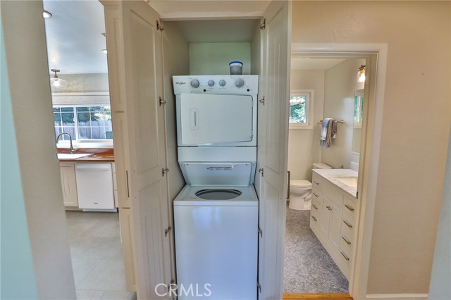Ta-Da! This laundry space provides your convenient washer and dryer, behind this door!