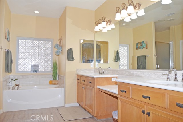 Main Suite Bath with BRAND NEW Waterproof Laminate Flooring, Dual Sinks & Vanity Area
