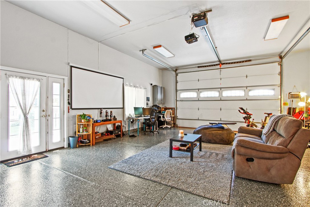 Garage with epoxy flooring, huge storage on top of garage… possible ADU