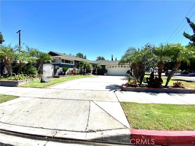 Just fell out of Escrow and back in the market. price just reduced for a faster sale!!! Hard to find a 4 bedroom / 2-bathroom home on a large corner lot approximately 
9,240 Sq.Ft. This beauty is situated along a tree-lined street in the Willow Park neighborhood 
Which is one of the most desirable area in the City of Anaheim. It is  near Disneyland 
and steps away from Willow Park that has full amenities of playground, basketball court, 
and is a beautiful greenery. Leased Solar is only $71.16 per Month but save you $$$$$ in your electricity bills. Spacious living room with a brick fireplace. Dining area off of livingroom and breakfast nook off of kitchen. Hardwood flooring in all of the rooms. Remodeled bathrooms. Double pane windows and sliding patio door. Spacious back yards with a large patio covers is great for gathering and 
entertainment. It could possibly fit an ADU unit ( Consult with the city). Large side entry gate could possibly leads your extra cars, boat or RV to the back yard.
( Buyer to measure and verify) This property is Conveniently located near dining, shopping, schools and freeways. Near School, Churches, shopping and neighborhood parks. For families looking for a great middle and high school, the desirable Oxford Academy is part of the school district. Close to major freeways 
and world known Disneyland, Knott's Berry Farm theme parks and within minutes to Southern California 
beaches.