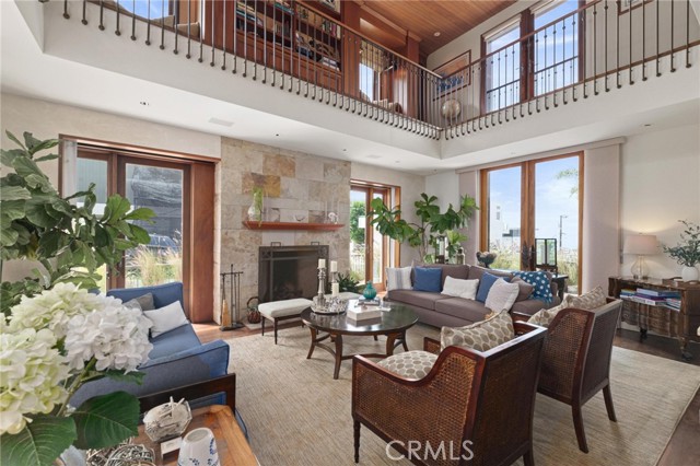 Vaulted Living room with doors to patio