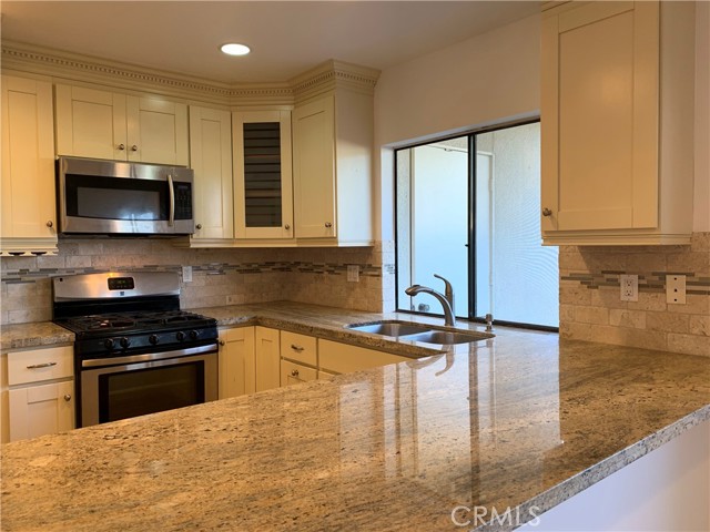 Detail Gallery Image 1 of 16 For 8877 Lauderdale Ct #214-C,  Huntington Beach,  CA 92646 - 2 Beds | 2 Baths