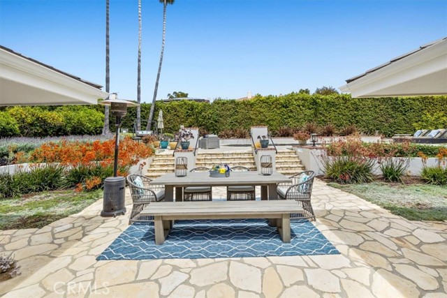 Lovely stone patio conveniently located off the Kitchen and Family Room.