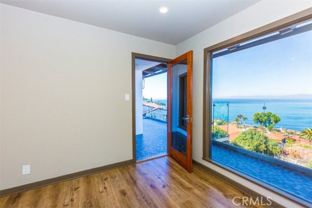 guest bedroom#1 with door to balcony