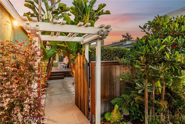 Entryway and side outdoor seating area