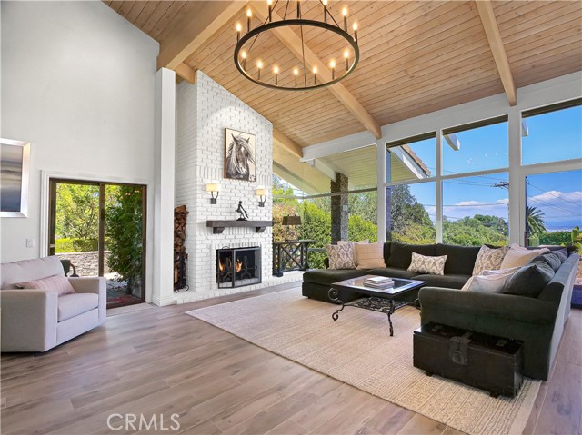 Huge Family Room with fireplace and lots of natural light.