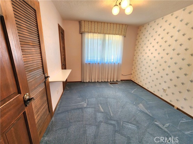 Spare bedroom with double closets