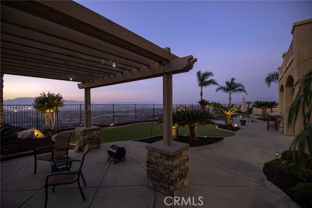 Backyard view from fireplace over to the pool and spa.  Look at that view!