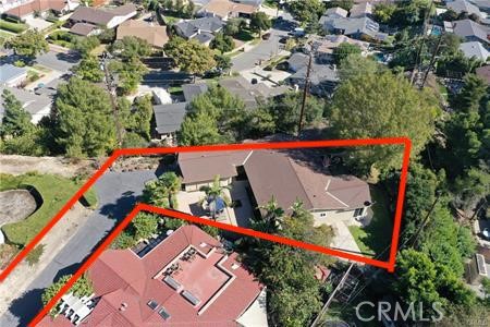 Red boundary lines in drone photos shown are an approximation of flat, useable lot, though the actual property boundaries extend beyond. Buyer to verify.