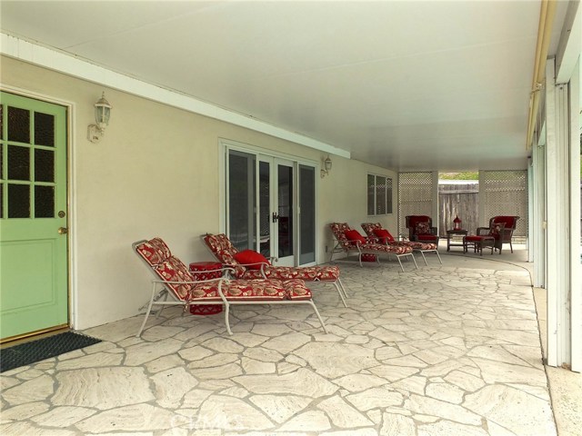 The exceptionally large patio cover allows for shade during the summer months and provides cover during a rainy day The exceptionally large patio cover allows for shade during the summer months and provides cover during a rainy day