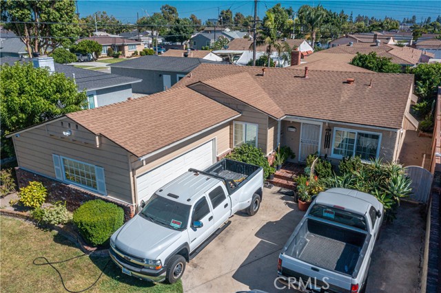 Aerial view of home showing garage