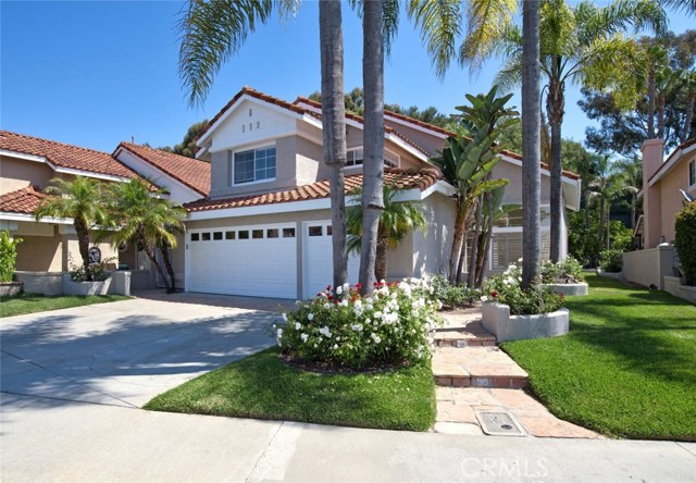 15 Sand Oaks Road Laguna Niguel, California GORGEOUS LAGUNA NIGUEL HOME on quiet cul-de-sac. This home features DOWNSTAIRS BEDROOM, spacious Living/Dining Room with vaulted ceilings, beautiful kitchen with breakfast nook that is open to the family room with fireplace. Huge Master Suite with soaking tub. Private backyard with beautiful lush landscaping and hardscape. Walk to George White Elementary, close to Hiking trails and parks