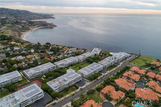 32700 Coastsite Drive 206 Rancho Palos Verdes, California Fixer Upper Delight! This 2 bed/2 bath 2nd level condo home located atop the hills & bluffs of the Palos Verdes Peninsula views of the Pacific Ocean at the quaint Palos Verdes Bay Club. Built-in 1964, the PVBC is the Southlands most fashionable & prime example of mid-century modern design. The geometric lines of the 10, 3-story residential buildings designed with an open floor plan, & the large balconies created to allow residents to enjoy the So Cal climate year-round. The PVBC was designed by local archFixer Upper Delight! This 2 bed/2 bath 2nd level condo home located atop the hills & bluffs of the Palos Verdes Peninsula views of the Pacific Ocean at the quaint Palos Verdes Bay Club. Built-in 1964, the PVBC is the Southlands most fashionable & prime example of mid-century modern design. The geometric lines of the 10, 3-story residential buildings designed with an open floor plan, & the large balconies created to allow residents to enjoy the So Cal climate year-round. The PVBC was designed by local architect Leuin & Pullan Architects. The Argosy-A floorplan is an end-unit corner condo welcoming you into a massive living area with ceiling to floor windows sharing abundant access to natural lighting, nature, and partial ocean views. The kitchen with bar-style seating, also facing the living area, calls for upgrades from the designer in you featuring plenty of pearly white cabinets for storage & kitchenware. The 2-bedrooms are expansive with the master bedroom opening conveniently to the patio. The master bathroom offers a dual sink vanity for ease and morning flow with options to also redesign based on your needs. Two available parking spaces are provided with on-site amenities including a fitness center, laundry, private beach, and nature access, two huge heated outdoor pools, jacuzzi, & two tennis courts. HOA is located on-site servicing resort-like comfort. Best kept secret for retirement living.