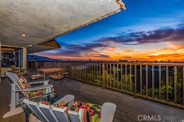 539 Avenue A Redondo Beach, California BEAUTIFUL EXECUTIVE PANORAMIC OCEAN VIEW TOWNHOUSE Beautiful Executive Six Bedroom end unit with one of the best panoramic ocean view from Palos Verdes to Malibu from this unique 2999 Sq. Ft. townhouse, the top floor has a wraparound deck and floor to ceiling windows that bring the ocean to the living room, formal dining room, wet bar, family room and kitchen. Gourmet kitchen has 42 feet of granite counter top, center island, two refrigerators, All Miele kitchen appliances, range, two ovens, warming draw, build-in streamer and espresso machine. Master bedroom has walk-in closet with new remodel bathroom, others bedrooms are large, walking distance to all public schools, several churches, Redondo Pier or shop in the Rivera Village, three short block walk to the beach, in addition the home has a self-contain in-law unit with separate entrance, kitchenette and stack washer/dryer. Two cars attached garage plus three addition parking spaces off alley