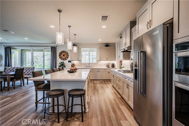 Your kitchen definetly is the focal point of this great room! A chef's dream