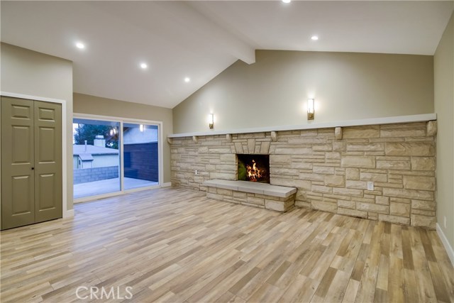 Vaulted Ceiling and Striking Fireplace