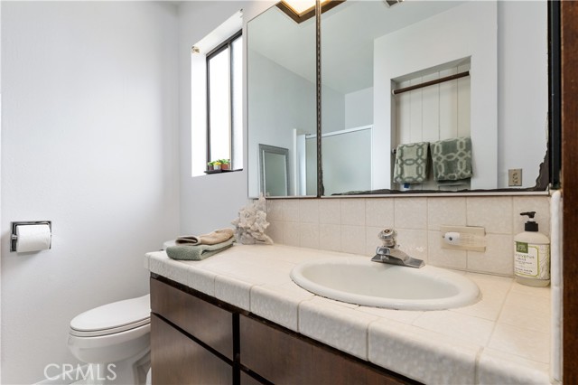 Primary bathroom with walk-in shower.
