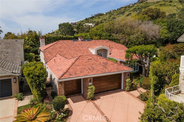 Spacious single-level living behind the exclusive gates of Emerald Ridge in beautiful Monarch Beach. This peaceful, cul-de-sac home offers high ceilings with a pool and a view of the Pacific Ocean. Greenery surrounds you as you head toward the private front door. Upon entry, you'll see the open floorplan and voluminous entry, fireside sitting area, living room, bar, dining room, family room and kitchen. French doors off of the dining room, living room, family room and master suite bring the outside into this great space. A three-car garage and large laundry room are right off the kitchen. On the north wing of the home are three large bedrooms, giving you, your family and your guests ultimate comfort in these private retreats. The secluded backyard & pool area provides a quiet escape, complete with an ocean viewing deck, barbecue and beautiful vegetation. As an added bonus, the entire home has been re-piped to PEX plumbing. 

Superbly located in one of the best areas in South Orange County, this special property sits on the border of world renown Laguna Beach and the coastal haven of Dana Point. It is surrounded by world class resorts -- Montage Laguna Beach, Waldorf Astoria, Ritz Carlton; premier golfing; famous beaches and easy access to Laguna Beach, Dana Point's Lantern District & harbor, as well as major highways to the rest of Orange County and nearby LA or San Diego. Emerald Ridge also offers community tennis/pickleball courts, the 4 acre oceanview 'Meadow' and a gate guard. Enjoy the best of Southern California living.