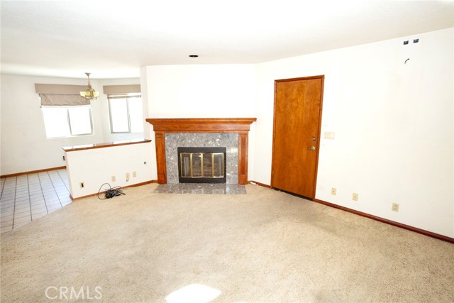 Family Room: Fireplace, direct access garage door