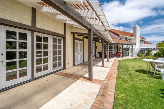 Lovely rear patio.  Pool/spa are ahead and to the right