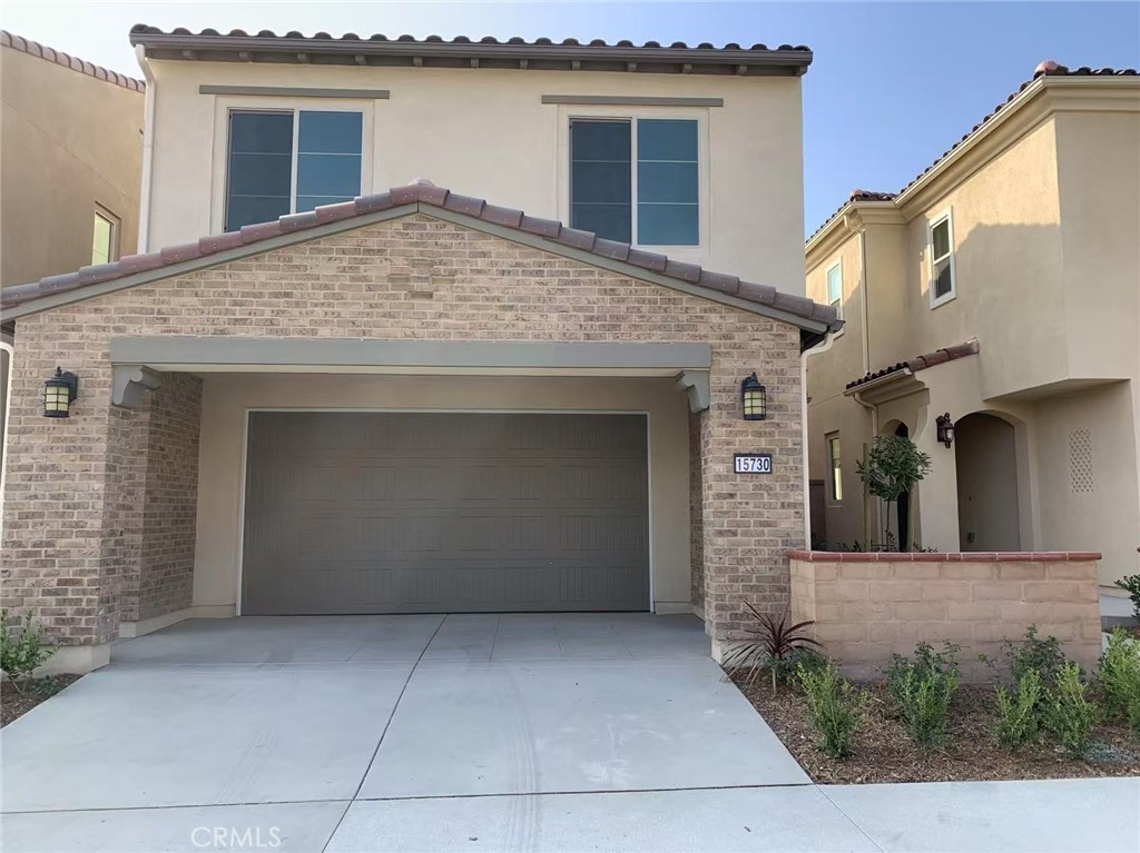 Located in the desirable “The Preserve” community of Chino, this beautifully designed two-story home welcomes you with a charming front porch and an inviting, open layout. Step into a bright foyer that leads to a convenient downstairs bedroom with a full bath—ideal for guests or multigenerational living.

The heart of the home is the expansive open-concept living area, featuring a designer kitchen equipped with stainless steel appliances, ample counter space, and a large center island—perfect for meal prep and entertaining. A spacious dining area is accented by a large window, creating a warm, light-filled space for everyday meals and special gatherings.

Upstairs, the luxurious owner’s suite offers resort-style comfort with an oversized walk-in closet, dual sinks, an oval soaking tub, a separate enclosed shower, and a private toilet area. Thoughtful details continue with an upstairs laundry room and additional well-sized bedrooms—ideal for a growing family or a home office setup.

The Preserve’s resort-style clubhouse offers a wealth of amenities for residents to enjoy. Situated on a spacious three-acre site, the clubhouse features a fully equipped fitness center, a game room, and a variety of recreational options. Outdoor amenities include two lighted tennis courts, a junior Olympic-sized swimming pool, a relaxing barbecue area, and more—perfect for entertaining, staying active, or simply unwinding close to home.
